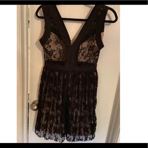 Black and beige lace cocktail dress